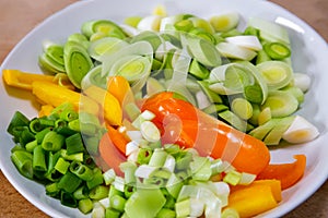 Sliced leeks, peppers and spring onions
