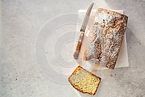 Sliced lemon cake with poppy seeds, top view