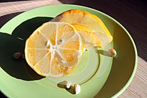 Sliced lemon. Home made lemon slices. Lemon slices on a saucer.