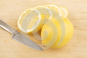 Sliced lemon and knive