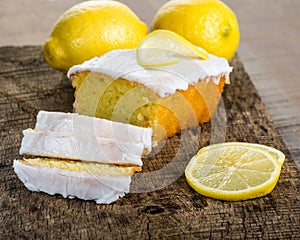 Sliced lemon pound cake with white icing