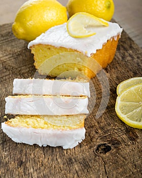 Sliced lemon pound cake with white icing