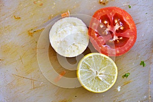 Sliced lemon, tomato and eggplant