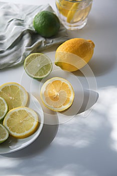 Sliced lemons and limes and refreshing drink
