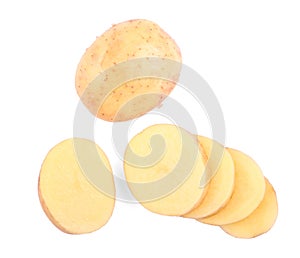 Sliced and light brown potatoes isolated on a white background. Chopped potatoes. Ripe potato tubers. Delicious vegetables.
