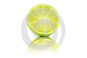 Sliced lime fruit with reflection isolated