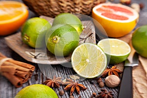 Sliced lime on a plate on wood