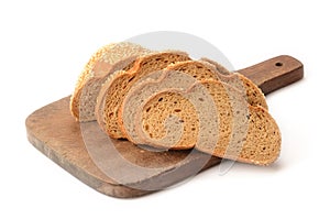 Sliced loaf of bread on a cutting board