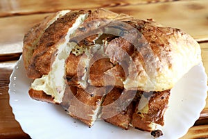 Sliced loaf of bread on plate