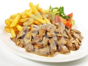 Sliced Meat Zurich Style with French Fries - Isolated