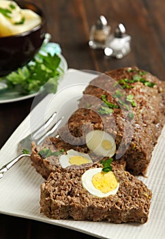 Sliced meatloaf with egg