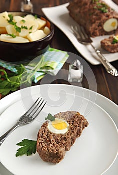 Sliced meatloaf with egg