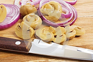 Sliced mushrooms and onions