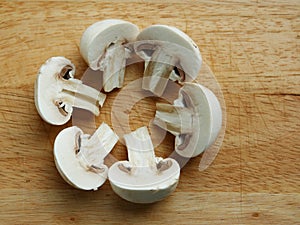 Sliced Mushrooms on Wood