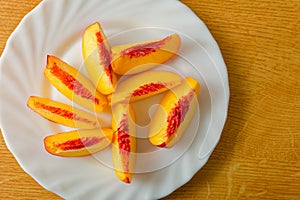 Sliced nectarine fruit on plate
