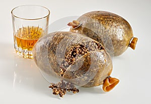Sliced open cooked haggis with whisky