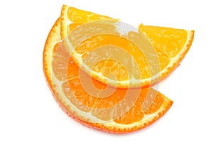 sliced orange fruit isolated on white background top view