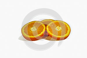 Sliced orange slices, stacked isolated on a white background