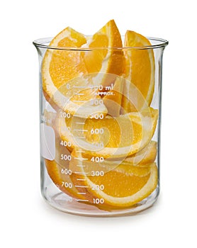 Sliced Oranges In A Beaker