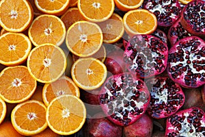 Sliced oranges and pomegranates