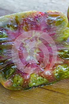 Sliced organic heirloom tomato