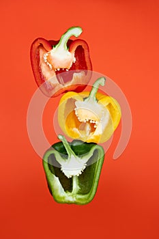 Sliced paprika on bright background. Cooking concept. Vegetables on color background .