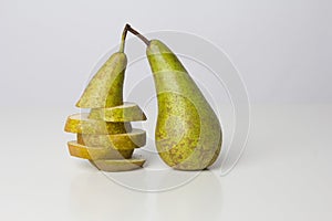 Sliced pear and whole pear