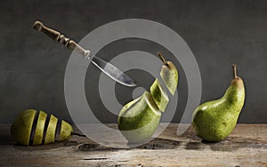 Sliced Pears and flying Knife