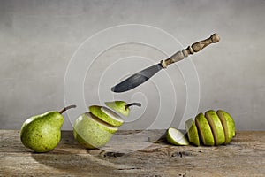 Sliced Pears and flying Knife