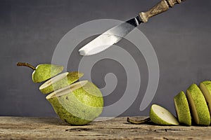 Sliced Pears and flying Knife