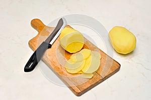 Sliced, peeled raw potatoes