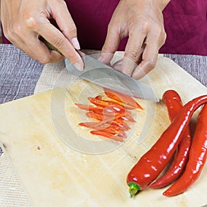 Sliced peppers on wood plate