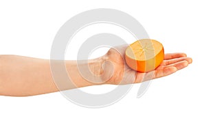 sliced persimmon in hand