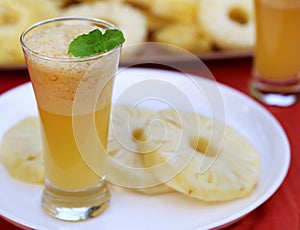 Sliced pineapple with juice