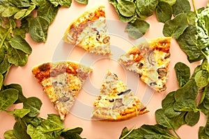 Sliced pizza. cheese on pink background. pizza slice top view. Italian traditional food with spinach