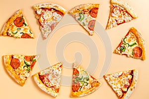 Sliced pizza in the form of a frame for a party. Pieces of pizza on a beige background. Space for text. Pizza menu