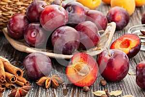 Sliced plum group on wood