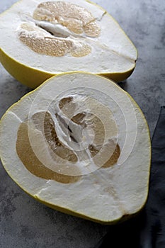 Sliced pomelo fruit isolated. Delicious citrus fruit. Healthy food