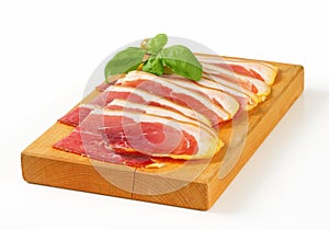 Sliced prosciutto crudo photo