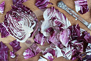 Sliced radicchio on wooden table. Selective focus