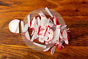 Sliced Radish Roots, Red Root Cuts, Red Radishes Slice Pile, Radis Pieces on Wood Background