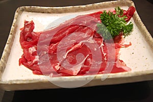 Sliced raw beef