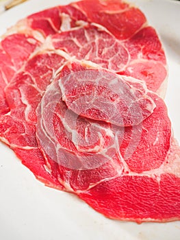 Sliced raw beef on the dish