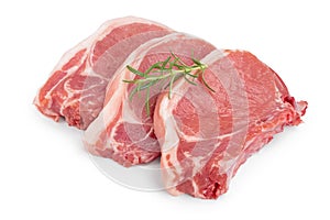 Sliced raw pork meat with rosemary isolated on white background