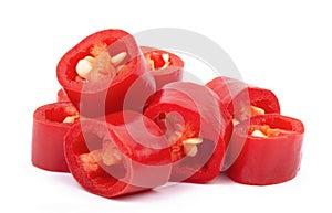 sliced red chilli cayenne pepper isolated on white background