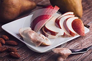 Sliced Red D`Anjou Pear With Almond Butter Spread