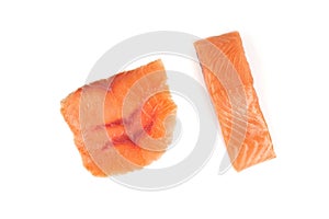 Sliced red fish with lemon on white background