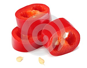 sliced red hot chili peppers isolated on white background