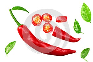 sliced red hot chili peppers isolated on white background top view