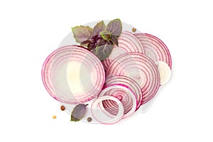 Sliced red onion with basil and pepper on white